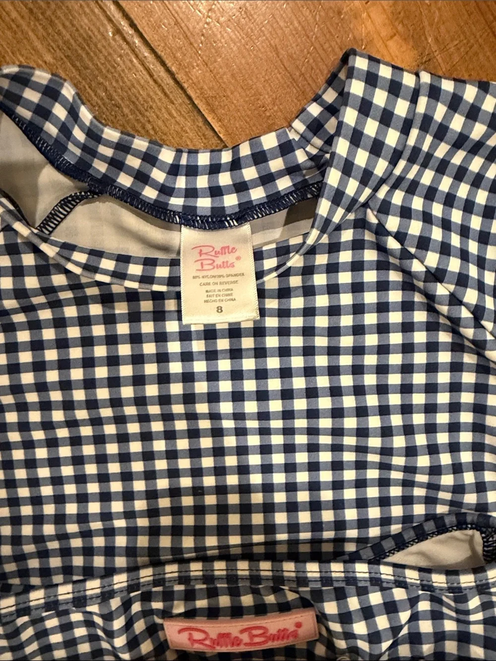 Ruffle Butts Navy and White Gingham Rash Guard